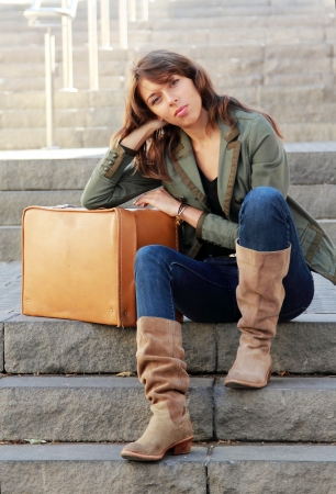 beautiful girl with vintage suitcaseの写真素材