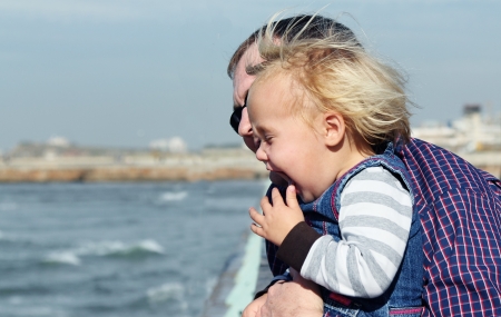 father and daughter on vacation at seaの写真素材