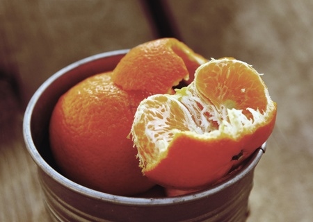 tangerines on a natural wooden table  Photo in old image style の写真素材