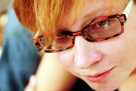 Close up portrait of attractive redheaded woman. Focus on the eyes. の写真素材