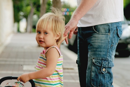 happy father with adorable girl outdoorの写真素材