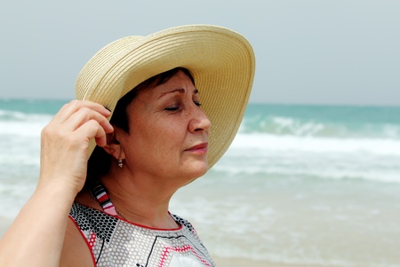 senior woman on summer vacation at seaの写真素材