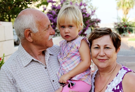 Happy Grandparents With Grandchildの写真素材