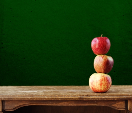 Fresh apples on wooden tableの写真素材