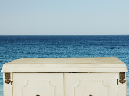 blue sea and sky with wooden vintage table backgroundの写真素材