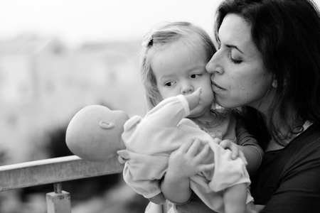 happy mom and daughter outdoorsの写真素材