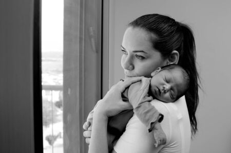mother with her newborn babyの写真素材