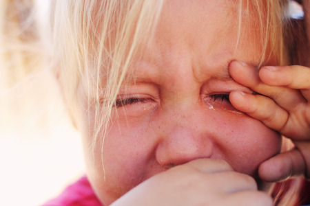 Angry upset girl with fatherの写真素材