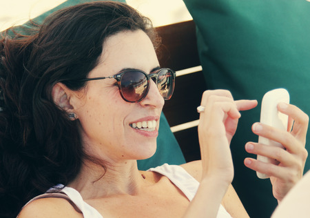 woman with laptop and smart phoneの写真素材