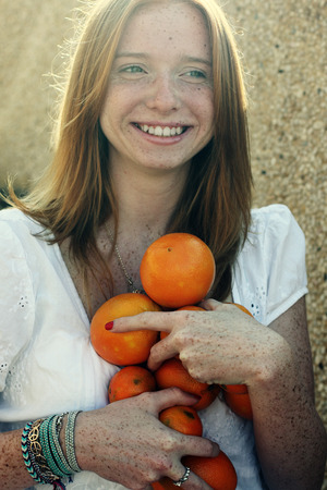 Closeup portrait of beautiful young redhead girlの写真素材