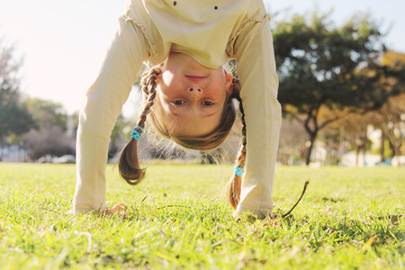 portrait of a beautiful happy smiling girl outdoorsの写真素材