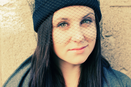 hipster young beautiful woman. outdoor street portraitの写真素材