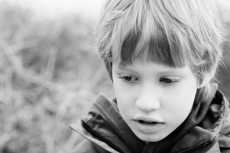 Outdoor portrait of 6 years old boyの写真素材