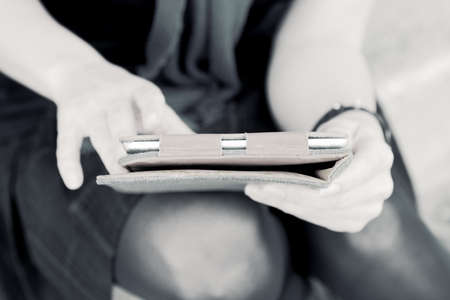 close up woman's hands with tabletの写真素材