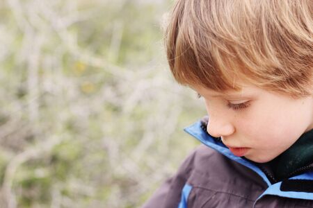 Outdoor portrait of 6 years old boyの写真素材