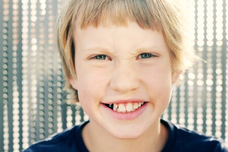 outdoor portrait of 7 years old boy smilingの写真素材