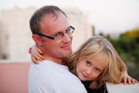 Cute portrait of father with his daughterの写真素材