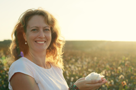 Portrait of beautiful 35 years old woman on sunset colorsの写真素材