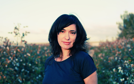 Portrait of beautiful 35 years old woman on sunset colorsの写真素材
