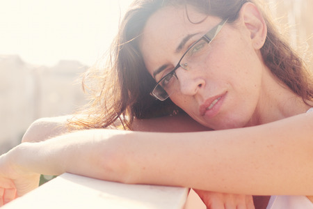 Portrait of beautiful 35 years old woman on sunset colorsの写真素材