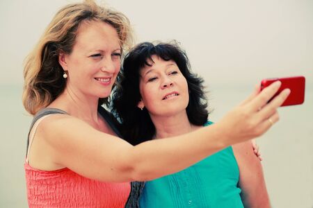 two best friends making selfie photoの写真素材