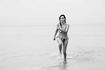 beautiful 35 years old woman on the seaの写真素材