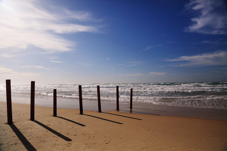 Wallpaper with winter beach in sunset colorsの写真素材