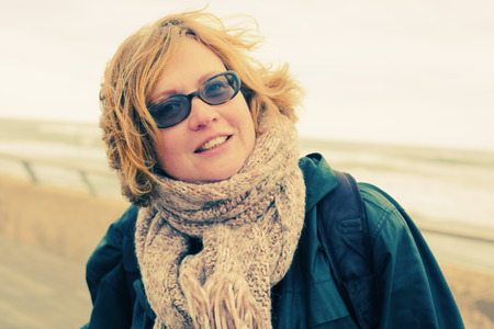 Portrait of beautiful 35 years old woman outdoorsの写真素材