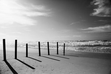 Wallpaper with winter beach in sunset colorsの写真素材