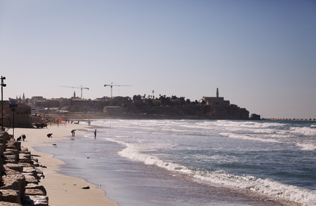 Wallpaper with winter sea and old Jaffaの写真素材