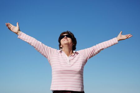 Portrait of senior woman on the seashoreの写真素材