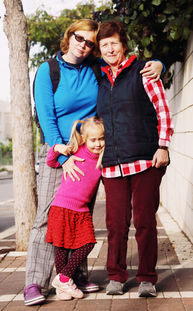 Family. Grandmother, mother and daughter outdoorsの写真素材