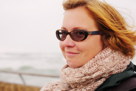 Portrait of beautiful 35 years old woman outdoorsの写真素材