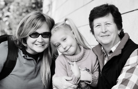 Family. Grandmother, mother and daughter outdoorsの写真素材