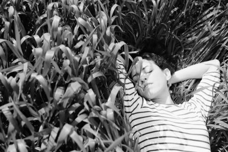 outdoor portrait of a beautiful middle aged womanの写真素材