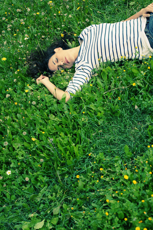 outdoor portrait of a beautiful middle aged womanの写真素材