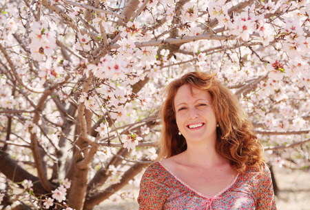 Spring portrait of beautiful 40 years old woman outdoorsの写真素材