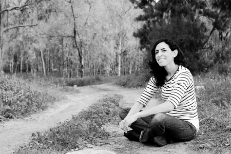 Portrait of beautiful 40 years old woman outdoorsの写真素材