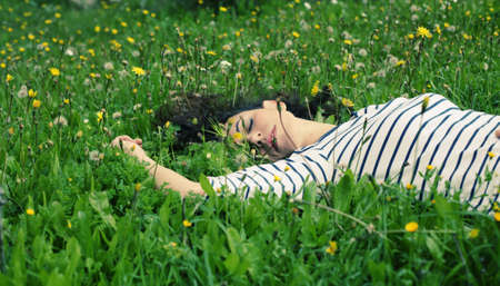 outdoor portrait of a beautiful middle aged womanの写真素材