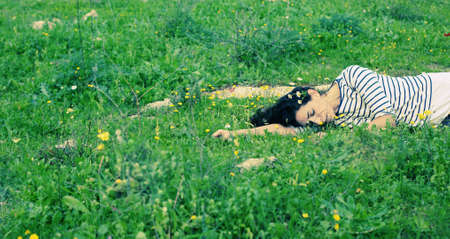 outdoor portrait of a beautiful middle aged womanの写真素材
