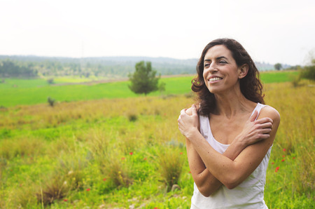 Portrait of beautiful 40 years old woman outdoorsの写真素材