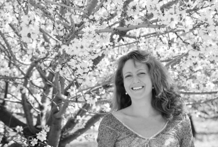 Spring portrait of beautiful 40 years old woman outdoorsの写真素材