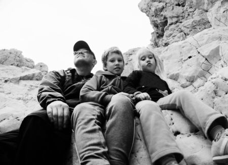 Portrait of father with two kidsの写真素材