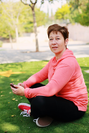 Portrait of beautiful 45 years old woman outdoorsの写真素材