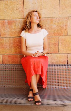 Portrait of beautiful 40 years old woman outdoorsの写真素材