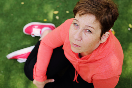 Portrait of beautiful 45 years old woman outdoorsの写真素材