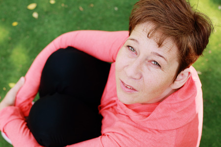 Portrait of beautiful 45 years old woman outdoorsの写真素材