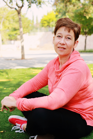 Portrait of beautiful 45 years old woman outdoorsの写真素材