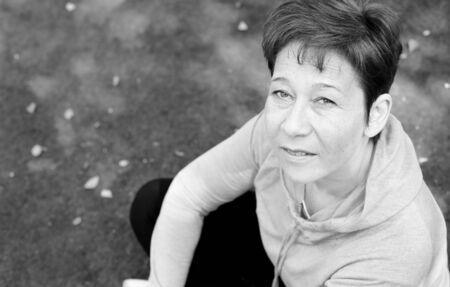 Portrait of beautiful 45 years old woman outdoorsの写真素材