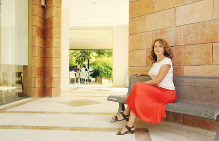 Portrait of beautiful 40 years old woman outdoorsの写真素材